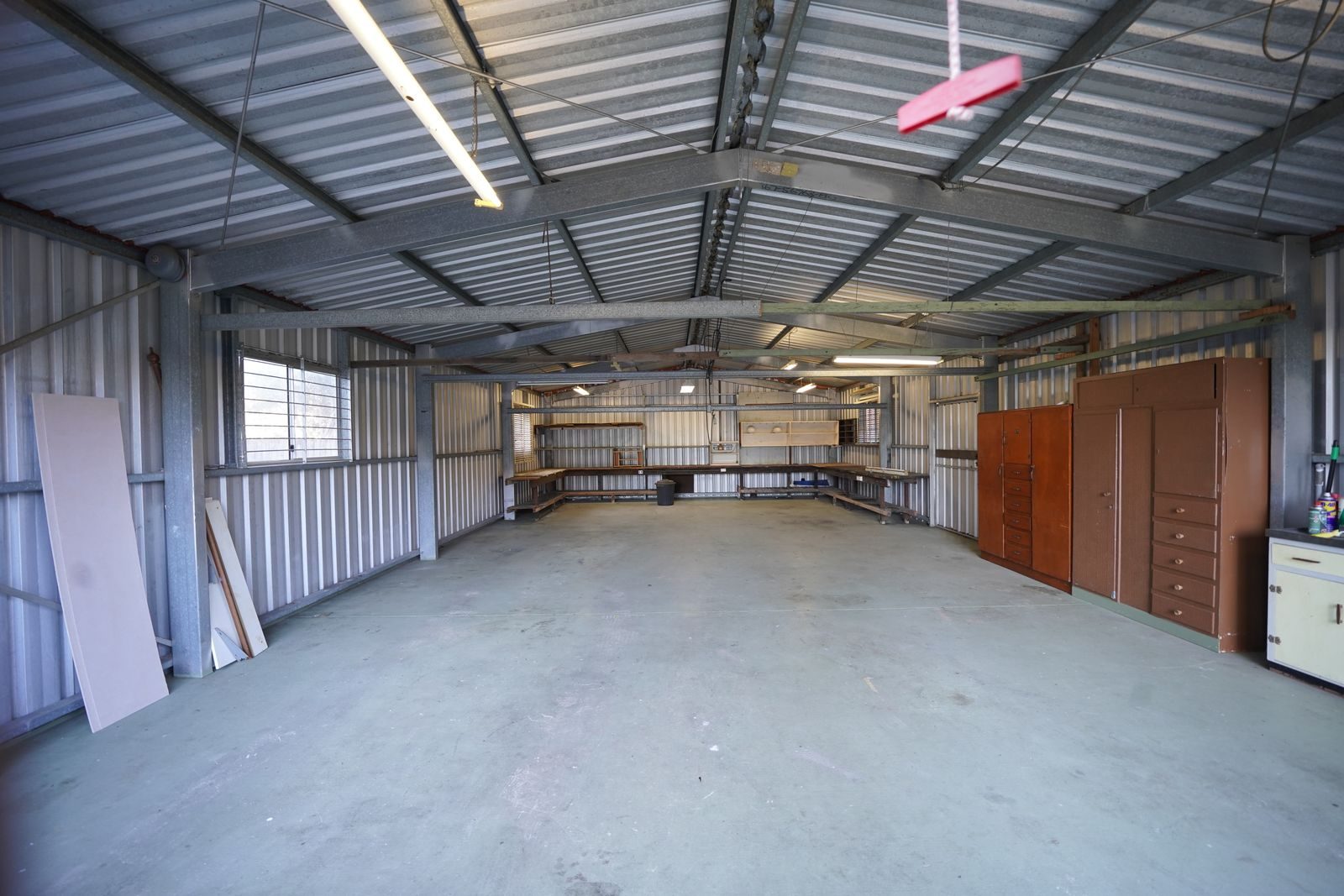 Open bay with a smooth concrete floor ready for epoxy
