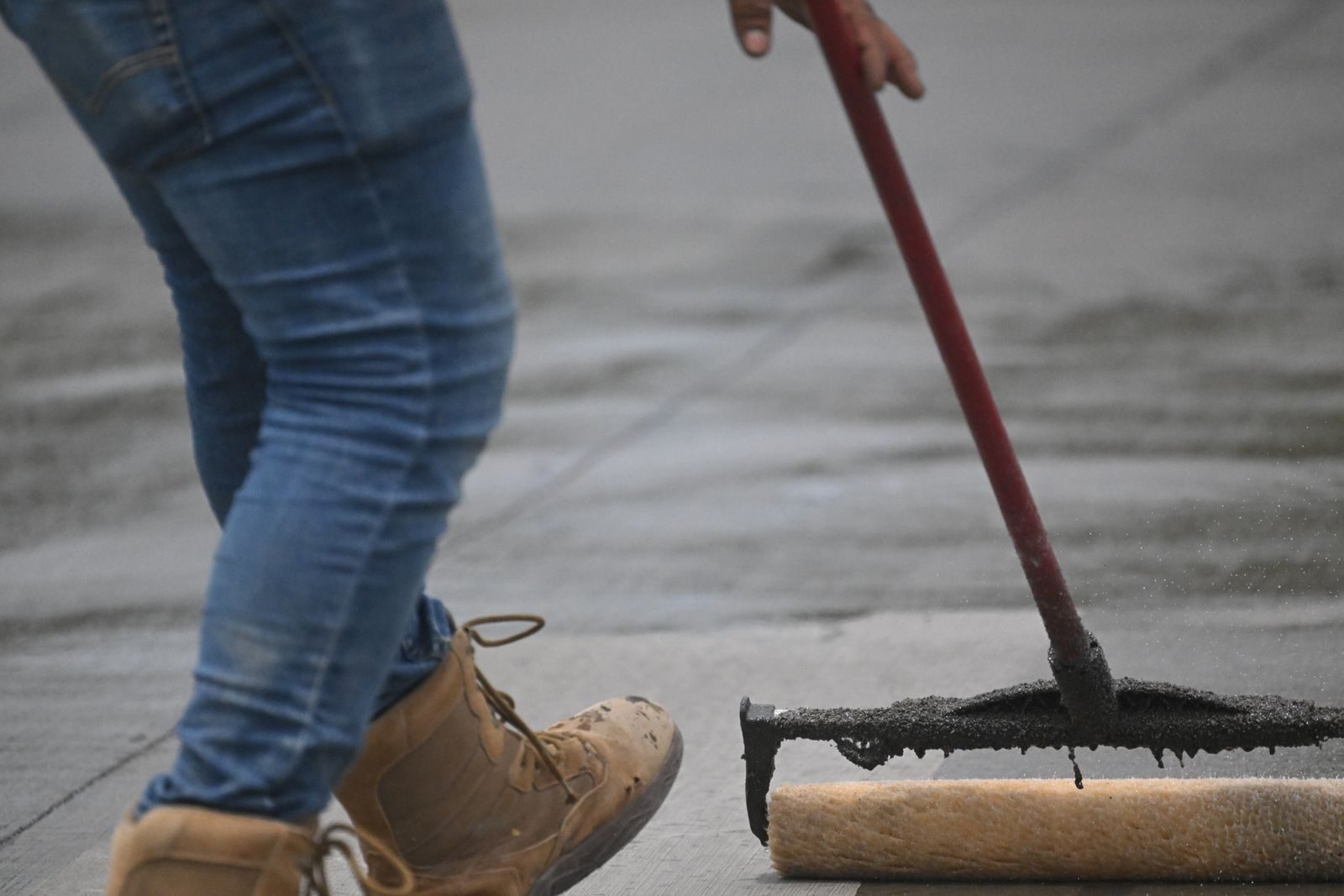 Sealant and coating work on prepared concrete